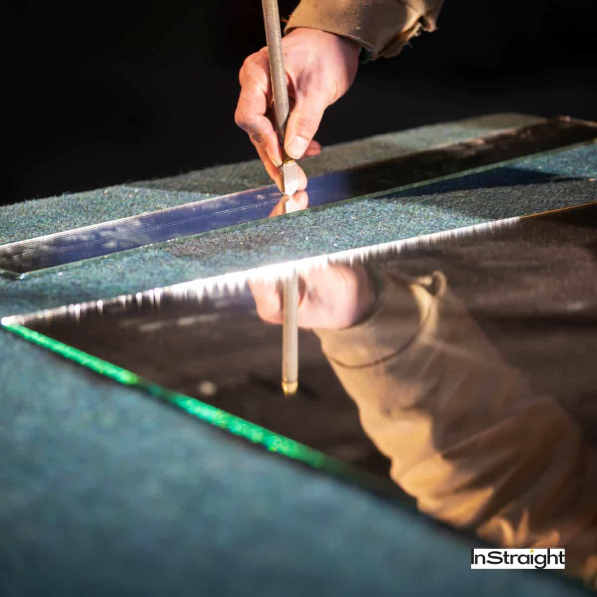 men trying to cut mirror but can bathroom mirrors be cut